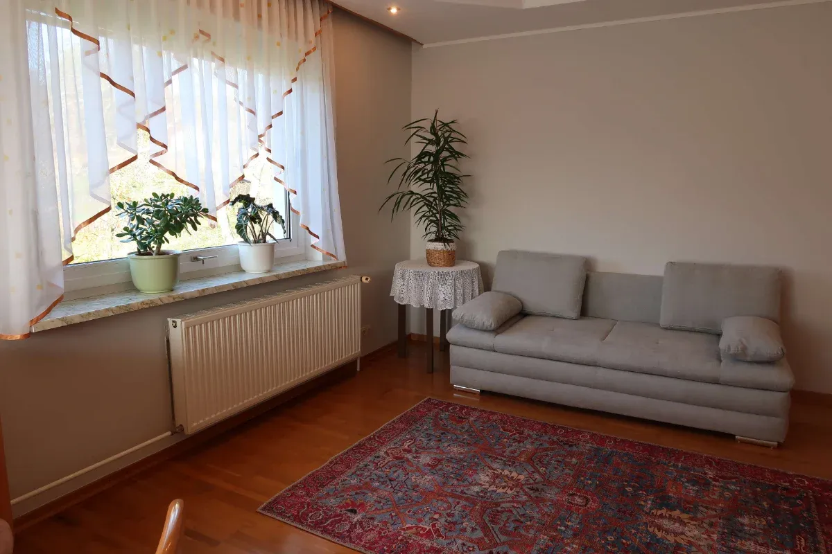 Living room area with seating and warm ambient light