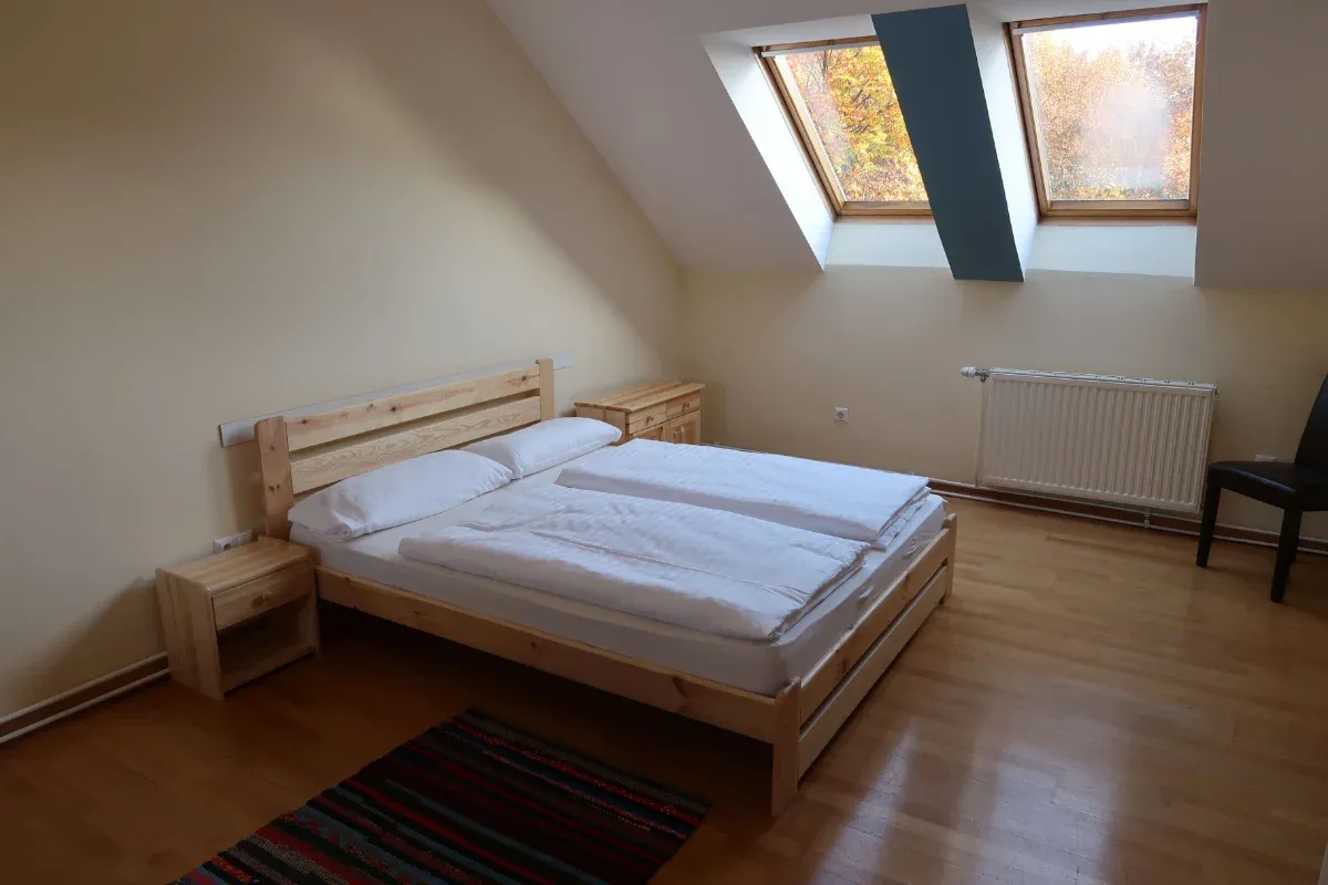 Comfortable bedroom with wooden details